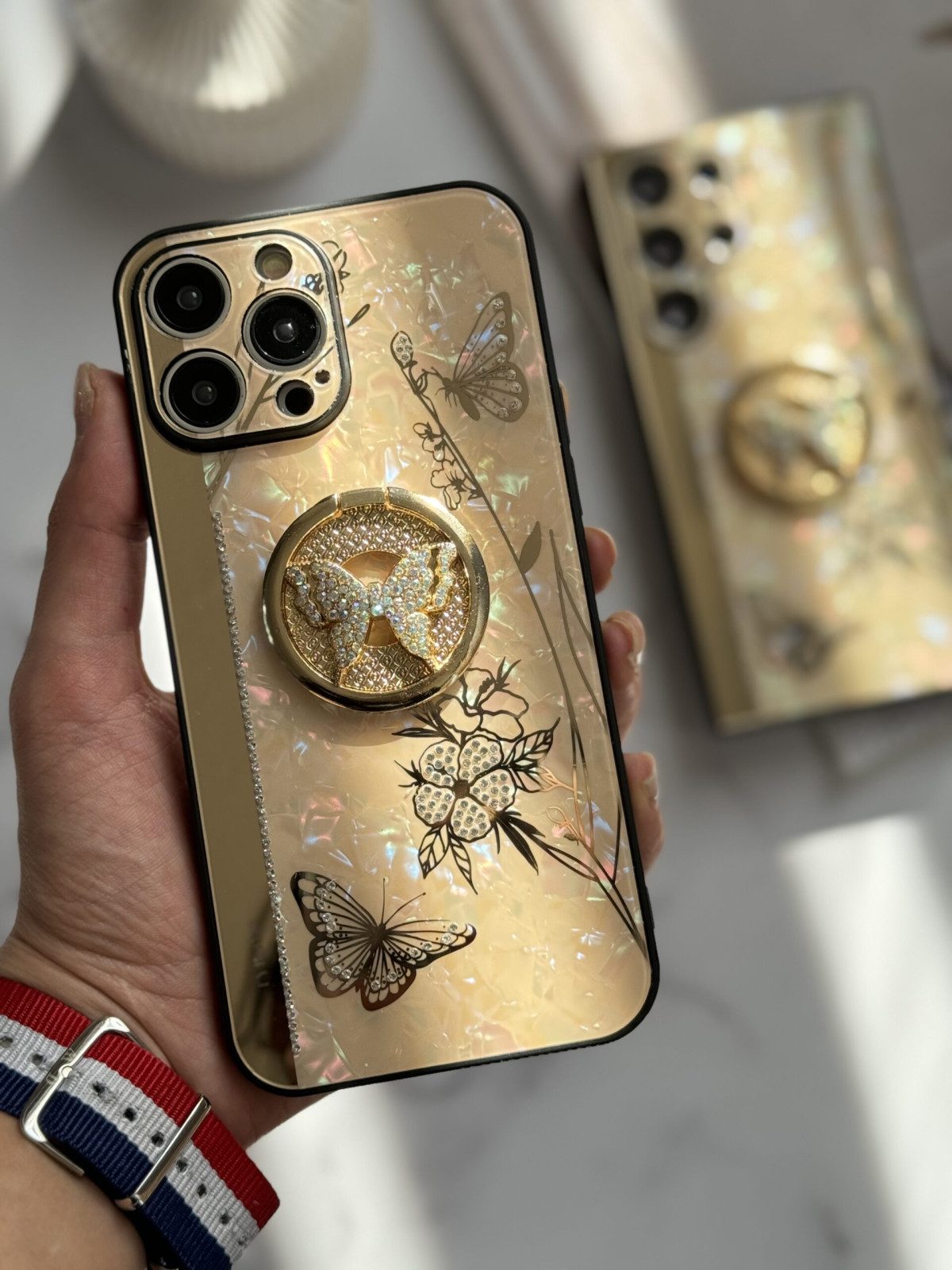 قاب موبایل آیفون پروانه نگین دار سواروسکی استندشو