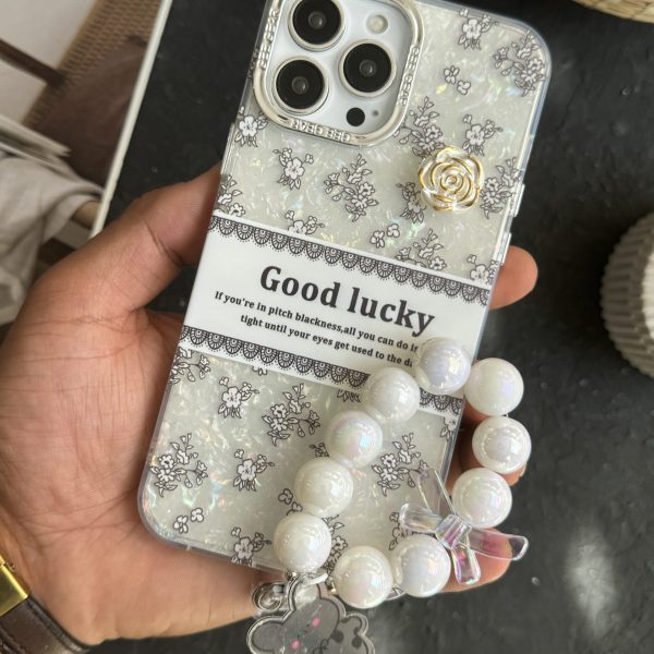 قاب موبایل ( آیفون - سامسونگ - شیائومی ) گل شانس صدفی + بندست