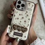 قاب موبایل آیفون گل چهارفصل فرگننت چرمی + استندقلبی